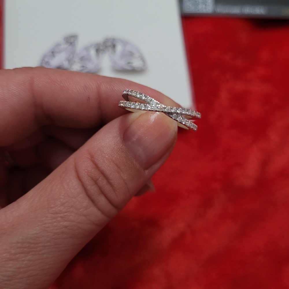 Elegant Silver Crossover Ring